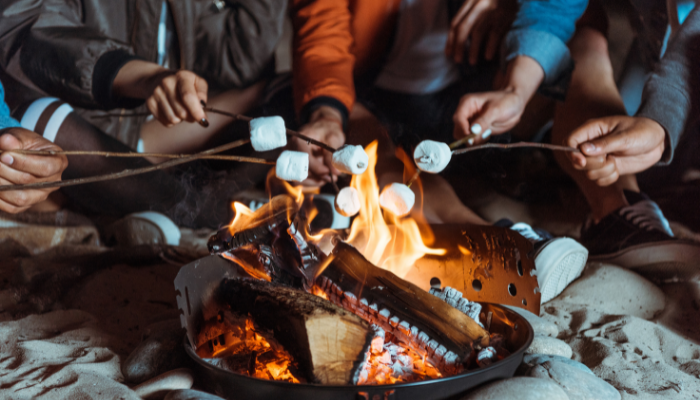 Roasting marshmellows in campfire